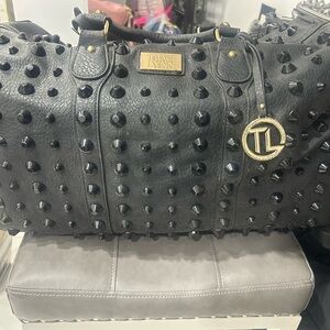 Traci Lynn Black Studded Travel Bag